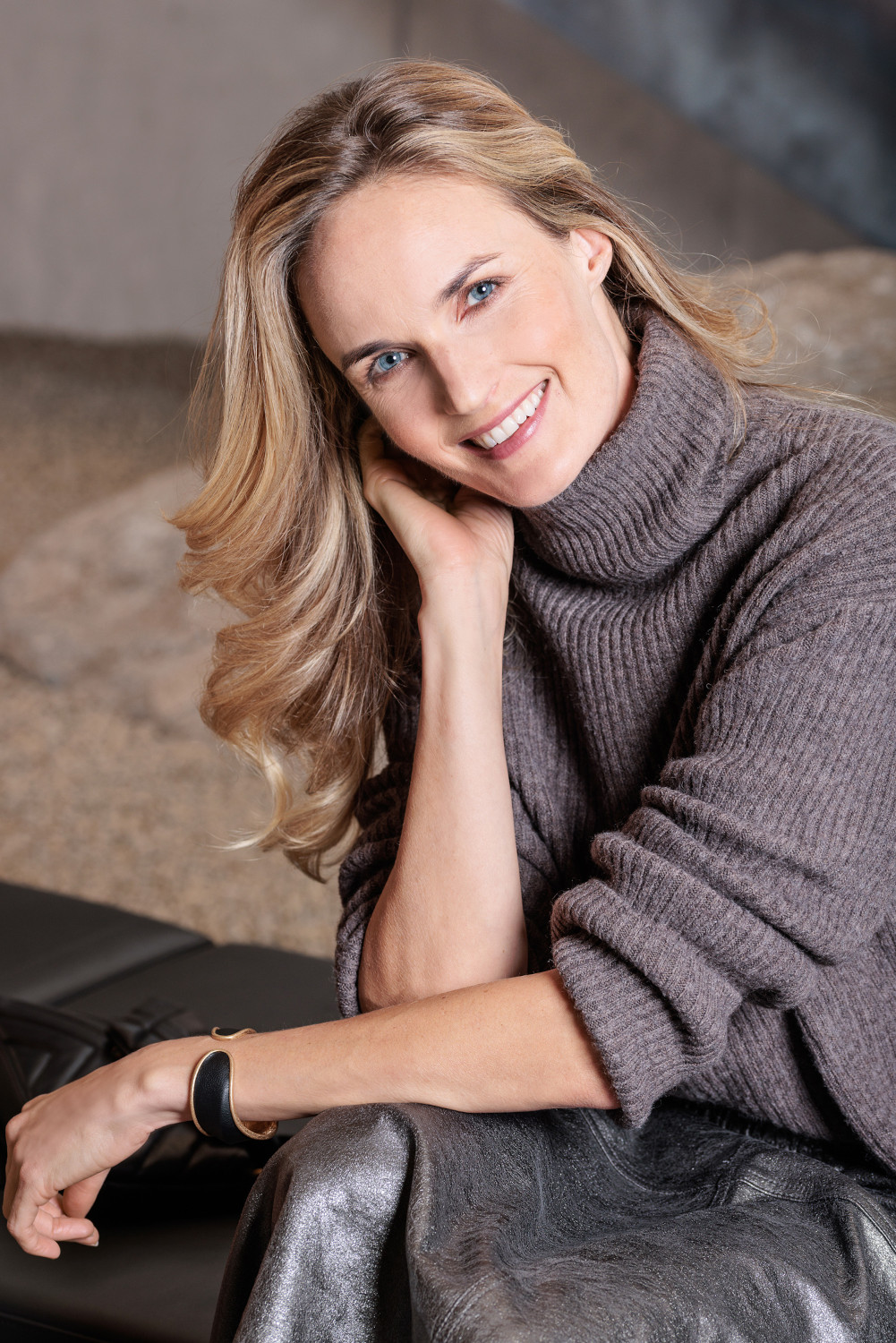 Happy woman smiling confidently – comfortable footwear makes a difference